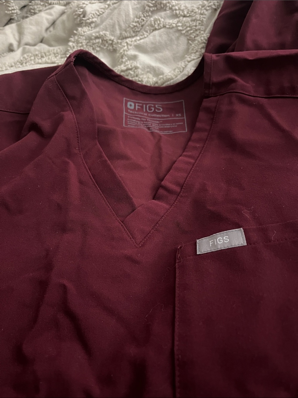 Figs women’s V-Neck scrub set in Burgundy with joggers and regular pants.